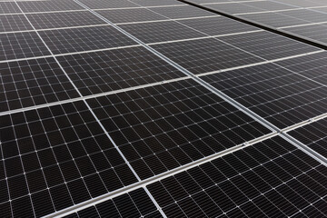 Details on surface close-up photo of newly installed solar panels clean. - 547377805