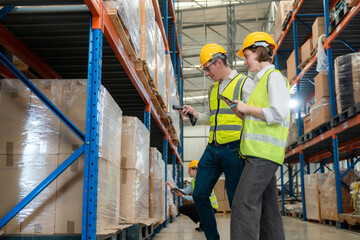 Female Inventory Manager Shows Digital Tablet Information to a Worker, They Talk and Do Work. In the Background Stock of Parcels with Products Ready for Shipment.