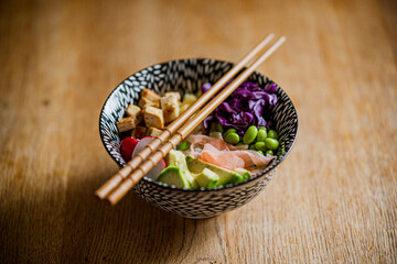 Chopsticks and poké bowl