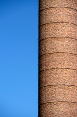 Antigua chimenea industrial en la Playa de la Misericordia, Malaga, Costa del Sol, Andalucia, España