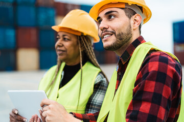 Industrial engineers working in the logistic terminal of container cargo