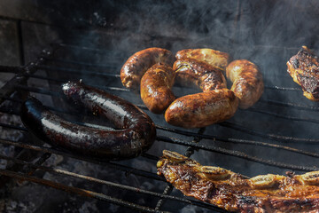Barbecue, grilled sausages and cow meat , traditional argentine cuisine