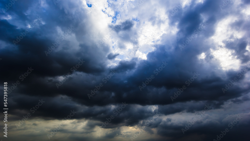 Aufkleber The dark sky with heavy clouds converging and a violent storm before the rain.Bad or moody weather sky and environment. carbon dioxide emissions, greenhouse effect, global warming, climate change
