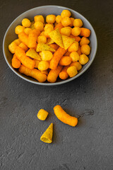 Variation of salty snacks in the bowl