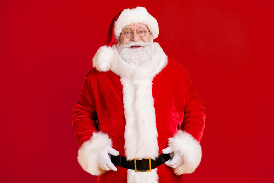 Photo of positive excited santa claus enjoy fairy jolly holly x-mas christmas celebration party wear red costume isolated over bright shine color background