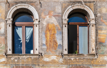Trento city: the facade of the palace Cazuffi- Rella (Fragolino 1531 - 1536) at the historic centre of Trento - Trentino Alto Adige - northern Italy, november 18, 2022
