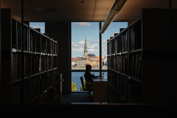 St. Peter's Church in Riga, seen through a window of the national library of Latvia. 