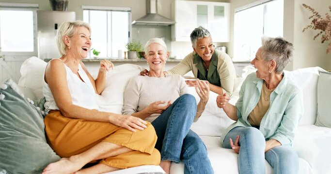 Senior woman, friends and relax in conversation, retirement or socializing together on the living room sofa at home. Happy women enjoying quality free time, bonding and social communication on couch