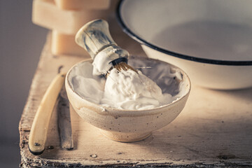Vintage and classic shaving tools with razor and soap.