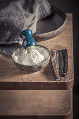 Vintage and classic barber equipment with razor and brush.