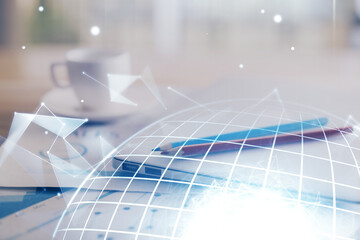 Double exposure of desktop with computer and world map hologram. International data network concept.