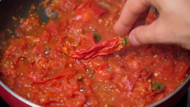 Sauce chilli is prepared in the kitchen. Homemade with traditional recipe organic food concept. Selective focus