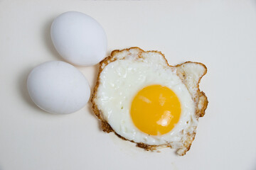 Fried egg and boiled eggs isolate on white background. Concept of healthy eating