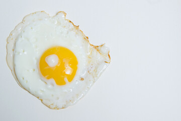 Fried egg isolate on a white background flatlay