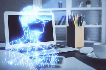 Computer on desktop with AR theme icon. Multi exposure. Concept of augmented reality.