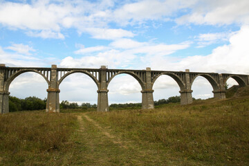 View of the abandoned old Mokrinsky railway bridge. Russia, the village of Mokry, the bridge was built in 1918