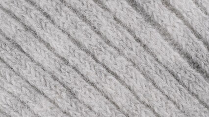 Fototapeta na wymiar Wool cloth texture in macro. Extreme detail view of Light grey wool texture