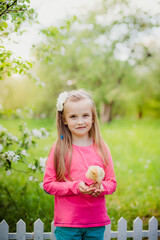 little girl in a garden