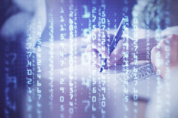 Double exposure of hands making notes background with technology and digital coding huds. Data learning concept.