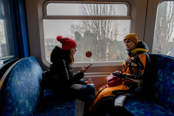 Transport. Women ride in a subway car. Denmark. Copenhagen.