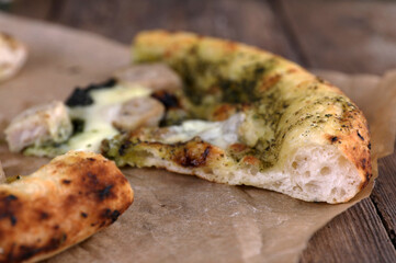 Neapolitan pizza with sausage and pesto