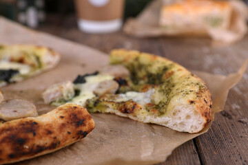 Neapolitan pizza with sausage and pesto