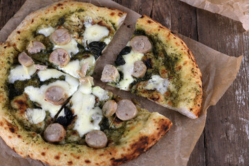 Neapolitan pizza with sausage and pesto
