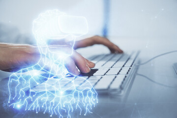 AR hologram with man working on computer on background. Augmented reality concept. Double exposure.