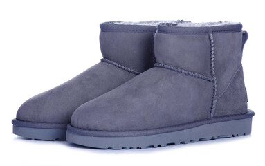 Women's gray winter boots on white background isolation