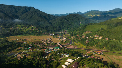Fototapeta na wymiar aerial view landscape and Sapan Village in valley, famous tourist attraction of Nan Province in the northern of Thailand