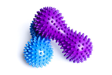 Blue and purple double or peanut spikey balls massager for yoga pilates or stretching and fascia pain. Sports equipment for fitness isolated on a white background. Concept of sports massage.