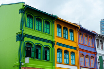 Colorful building in Haji Lane, Singapore. It is known for it's shops, attracting many tourists and young people - obrazy, fototapety, plakaty