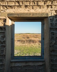 Window in an uncompleted building in the city of Italy.