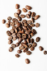 Roasted coffee beans on a white background.