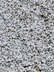 a scattering of white gray black stones