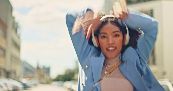 Music, dance and stylish black woman in the city street for fashion, smile and 5g radio. Creative, technology and portrait of dancer dancing with streaming audio on headphones in road for happiness