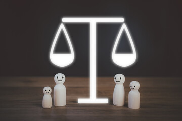 Family wooden peg doll under court gavel sign, litigation concept for child custody, family split,...