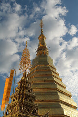 Fototapeta premium The golden chedi with blue sky background