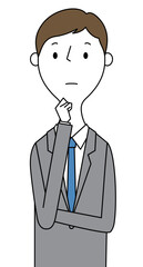 考える若いビジネスマン