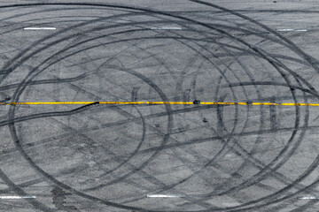Top view tire tracks texture and background, Asphalt texture with line and tire marks, Automobile...