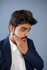 young indian business man isolated on plain, giving different poses