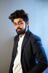 young indian business man isolated on plain, giving different poses