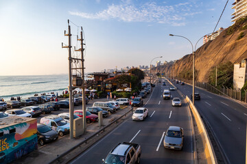 Driving along the green coast of Lima city you can see the beautiful beach of the Barranco district.