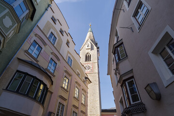 Street and White Tower in Brixen, Italy