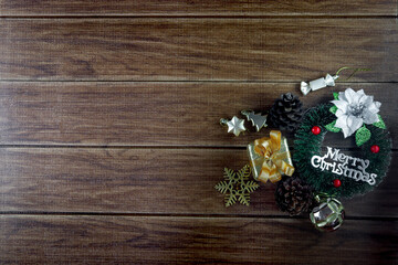 Christmas holiday composition, beautiful Xmas black board framed decoration items, calibration winter holiday wooden background with festive decorative elements and copy space for text