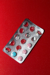 colorful pills in blister silver, vitamin C, various trace elements