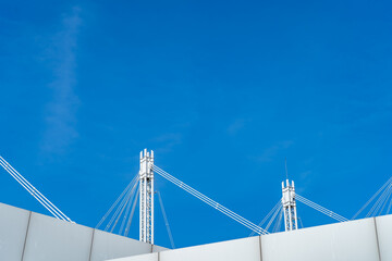 Fototapeta premium Steel white frame structure with blue sky background