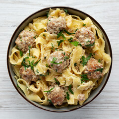 Homemade One-Pot Swedish Meatball Pasta in a Bowl, top view. Flat lay, overhead, from above. Close-up.