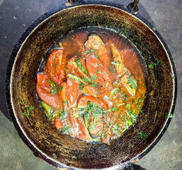 Bengali fish curry in pan. This is popularly known as Chital macher jhol in Bengali language. Clown knife fish. Bengal food or dish. Chitala chitala.