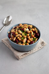 Homemade Three Bean Salad in a Bowl, side view.